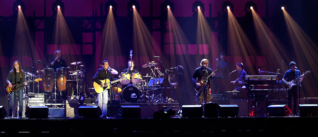 Eagles members Timothy B. Schmit, far left; Glenn Frey, third from left; Don  Henley, fourth from left; and Joe Walsh, fifth from left, perform in their 